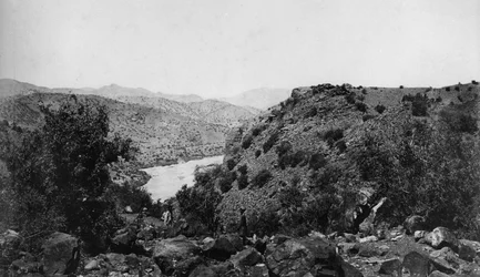 Local Men Standing on a Rocky Hillside
